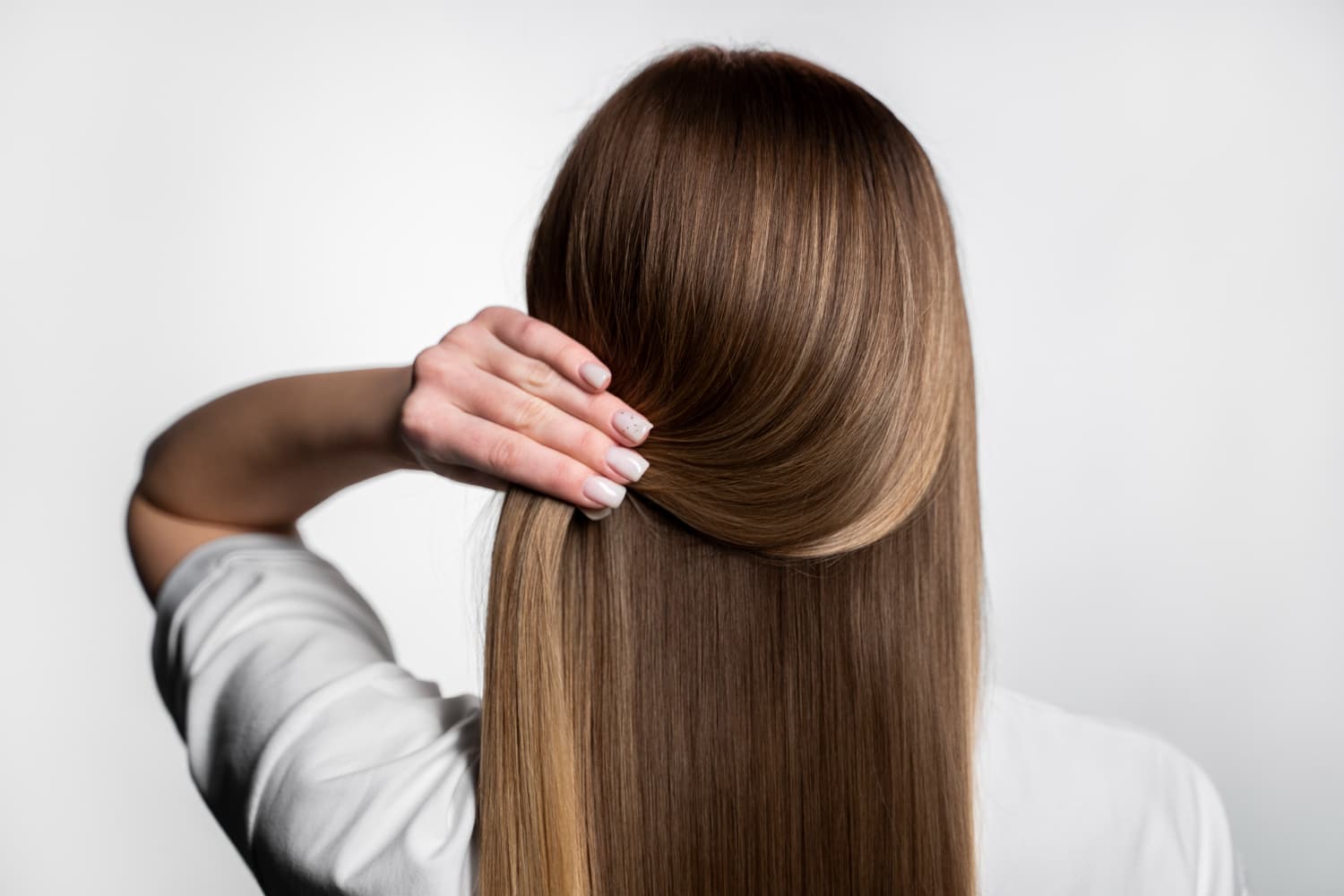 Long, smooth and shiny hair after a Synergistic Alignment treatment by Aude Cosmetics